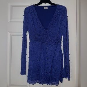 Oh Polly dress with built in bodysuit size 6. Worn one time to the Eras Tour.